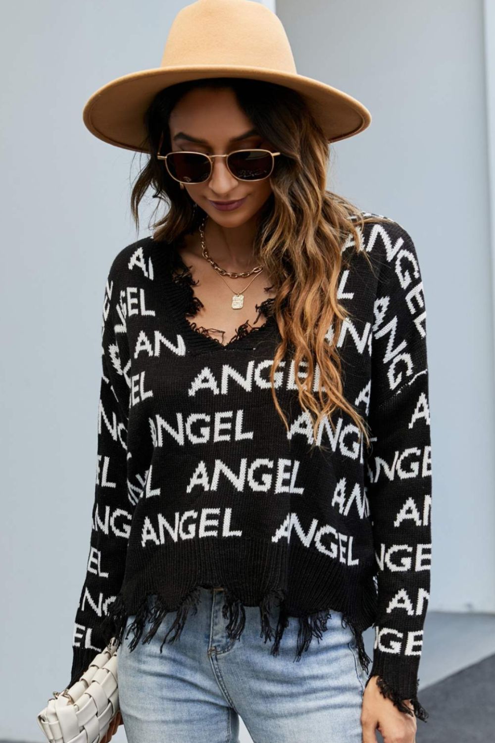 ANGEL Distressed V-Neck Dropped Shoulder Sweater